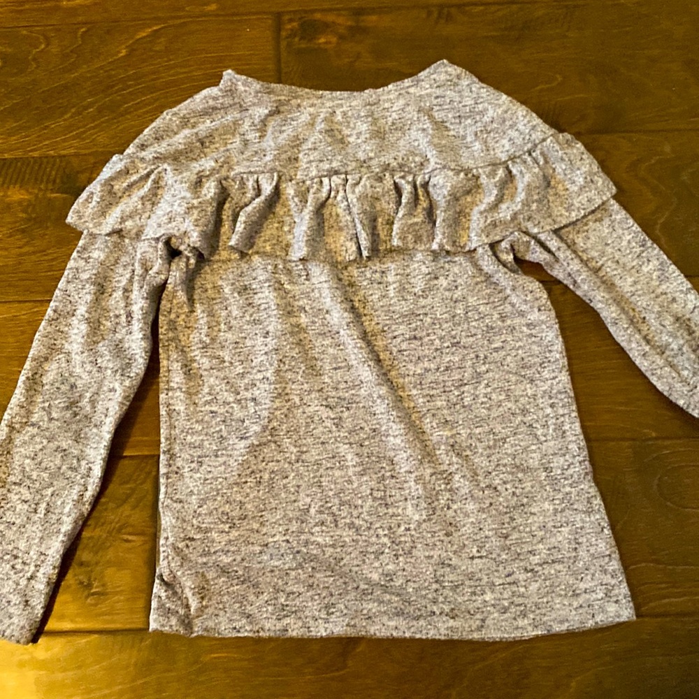 I am selling a gray long shirt.